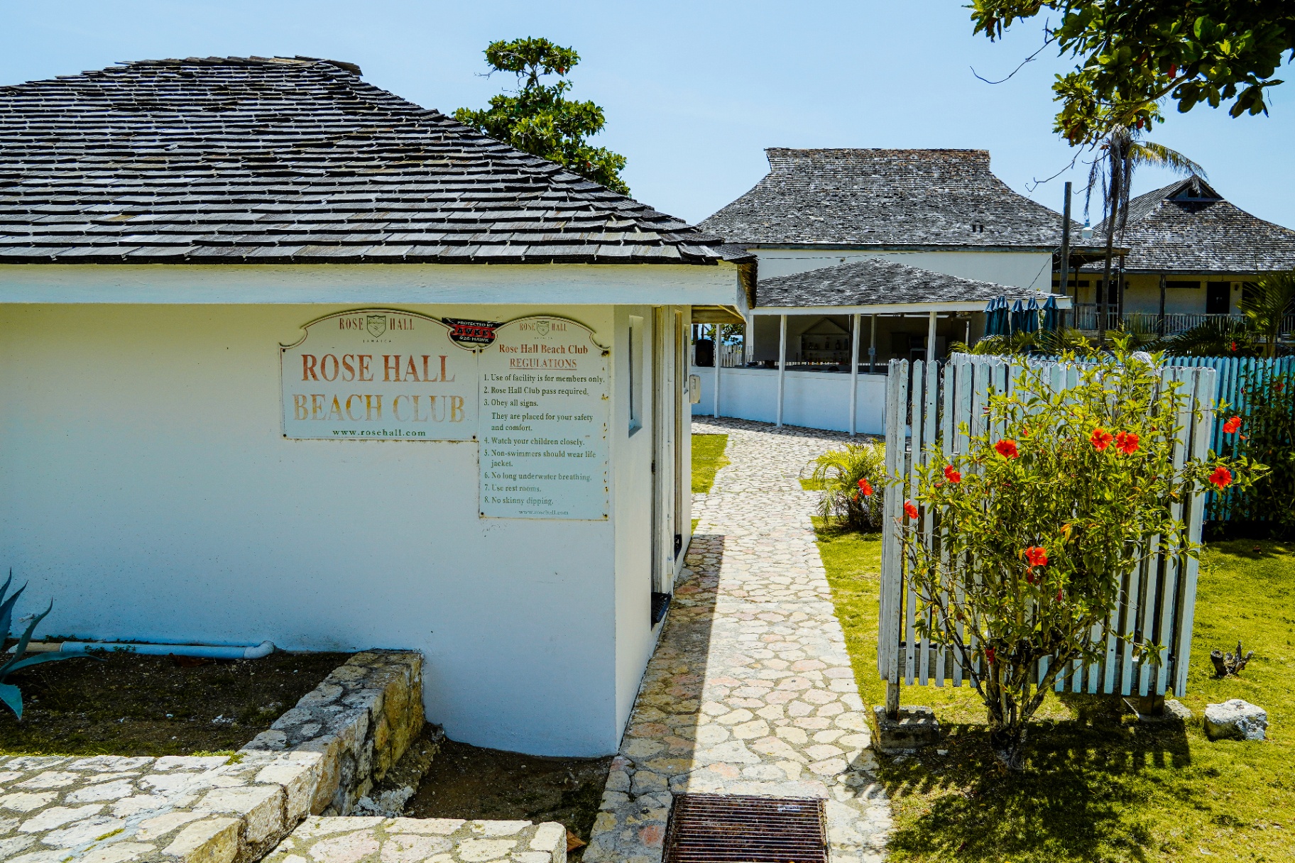 Rose Hall Beach Club entrance sign and pathway into the club